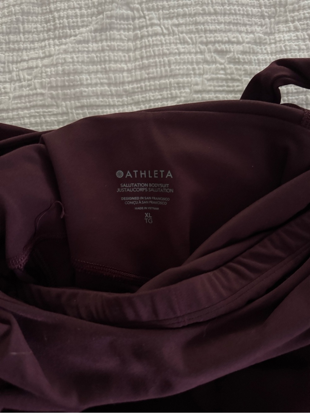 Athleta Salutation Bodysuit in Plum